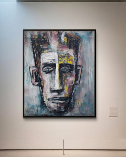 Abstract painting of a face on a wall in an art gallery