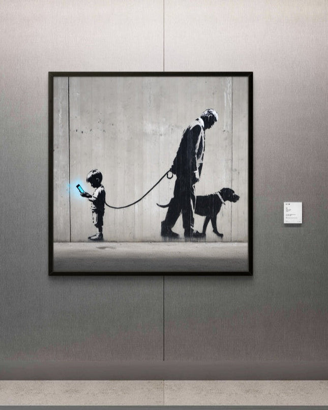 Framed artwork of a man and child with a dog on a leash, displayed on a wall.