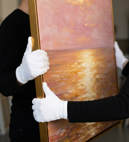 Art handler presenting Golden Horizon large-format original painting