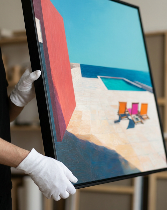 Art handler presenting Quiet Escapes large-format original painting