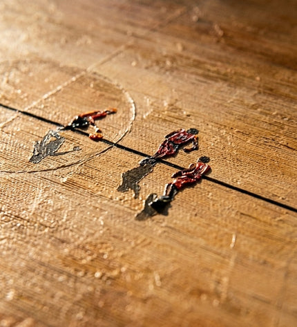 Close-up detail of Golden Arena showing textured brushstrokes and warm amber tones