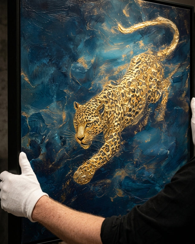 Goldstrike original oil painting held by a gallerist with white cotton gloves, golden leopard impasto close-up