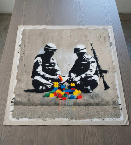 Peace Builders hand-painted original as unrolled canvas on studio table, shown without frame
