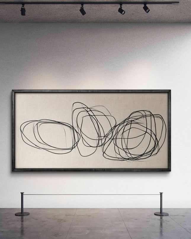 Abstract art piece on a wall in a gallery setting