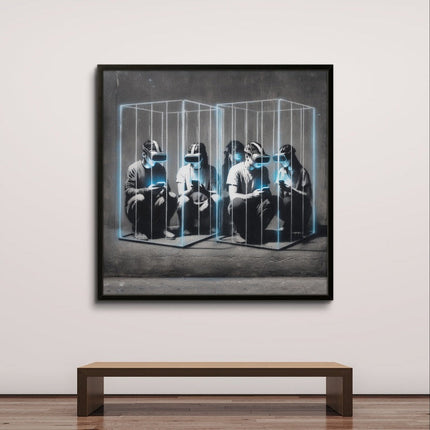 Framed artwork of people sitting inside a glass box on a white wall with a wooden bench below.