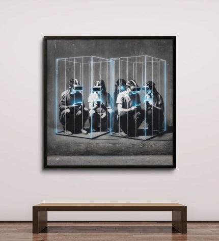 Framed artwork of people sitting inside a glass box on a white wall with a wooden bench below.