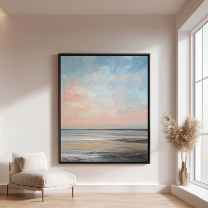 Framed abstract painting of a sunset over water in a modern living room.