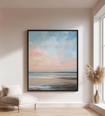 Framed abstract painting of a sunset over water in a modern living room.